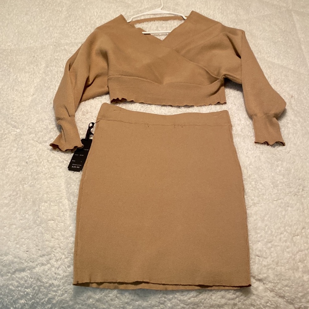 Sweater Set . Originally $39.99 . Never worn . Tags still on